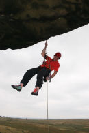 06-8117 Rock Climber Abseiling into Free Space Below an Overhang, Teesdale, County Durham